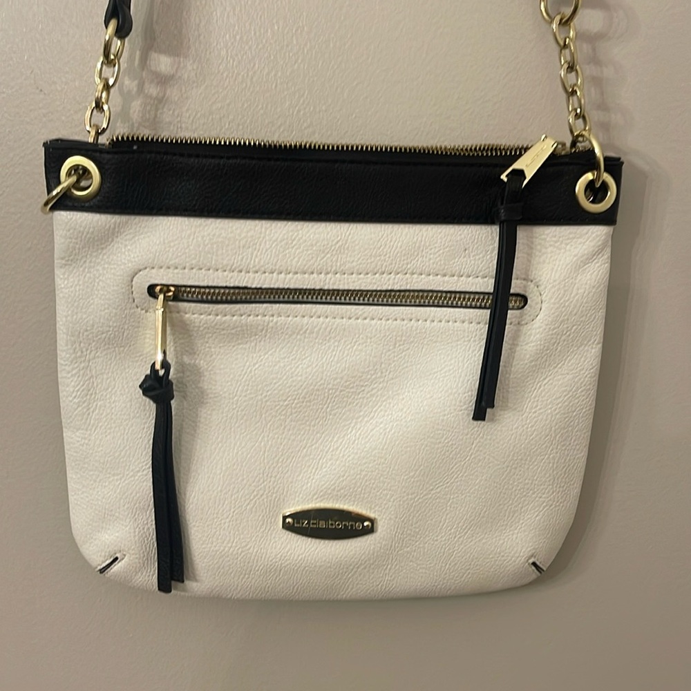 Fun white purse with black details!